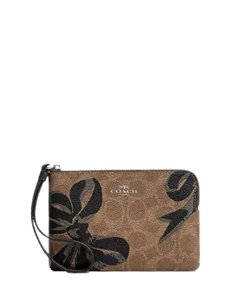 Coach Corner Zip Wristlet In Signature Canvas With Bow Print