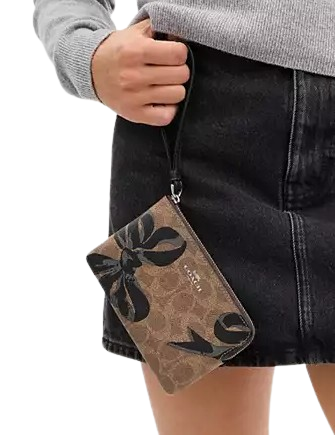 Coach Corner Zip Wristlet In Signature Canvas With Bow Print - Image 2