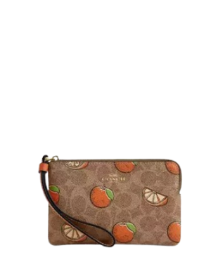 Coach Corner Zip Wristlet In Signature Canvas With Orange Print